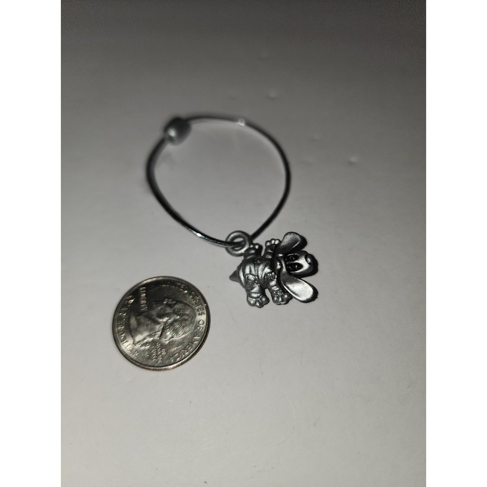 Vintage Plastic Pound Puppies Charm